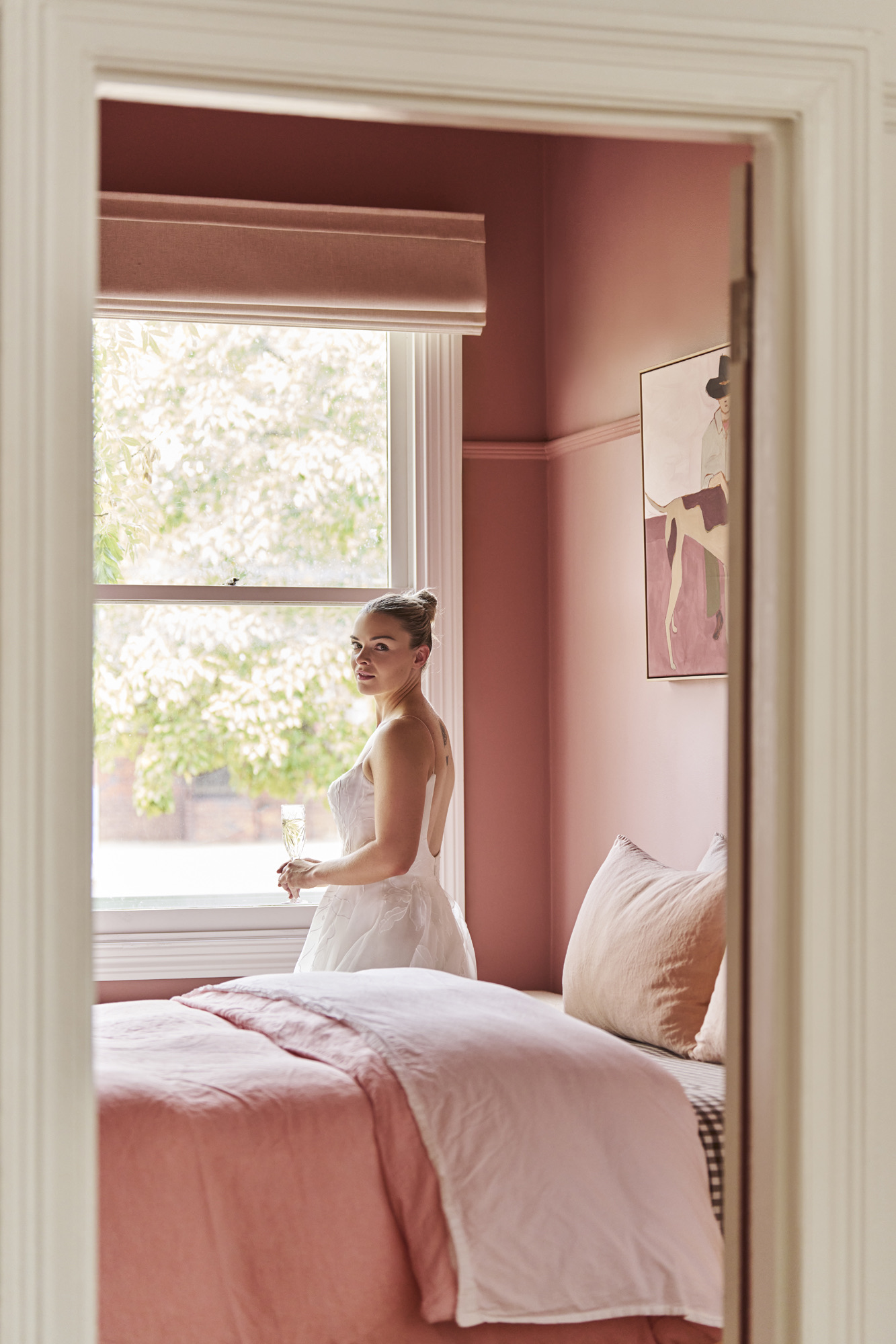 Bride in a dress, soft window light at Zalm